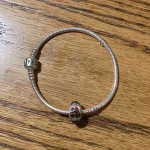 Pandora bracelet with purple murano butterfly